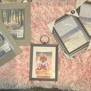 Five picture frames, four 5x7 and one 3.5x5